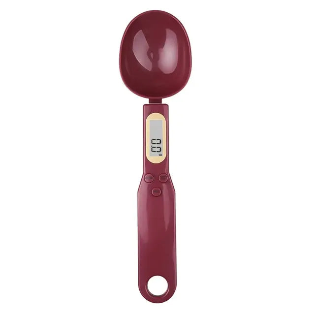 Spoon scale being used to measure baking powder on kitchen counter