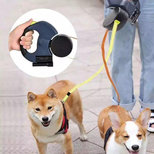 Dual retractable dog leash with ergonomic handle